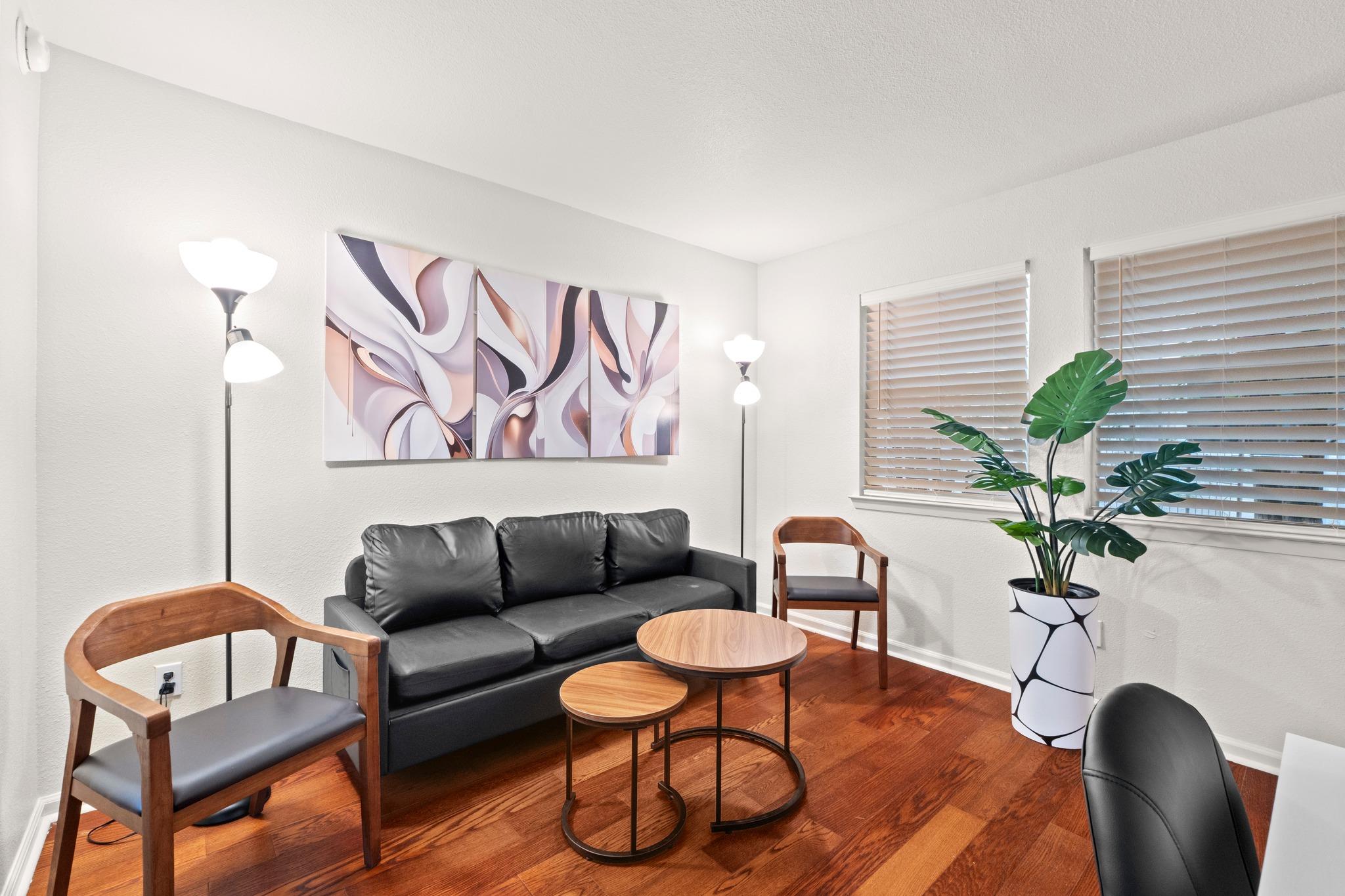 Rich hardwood flooring anchors this versatile spa