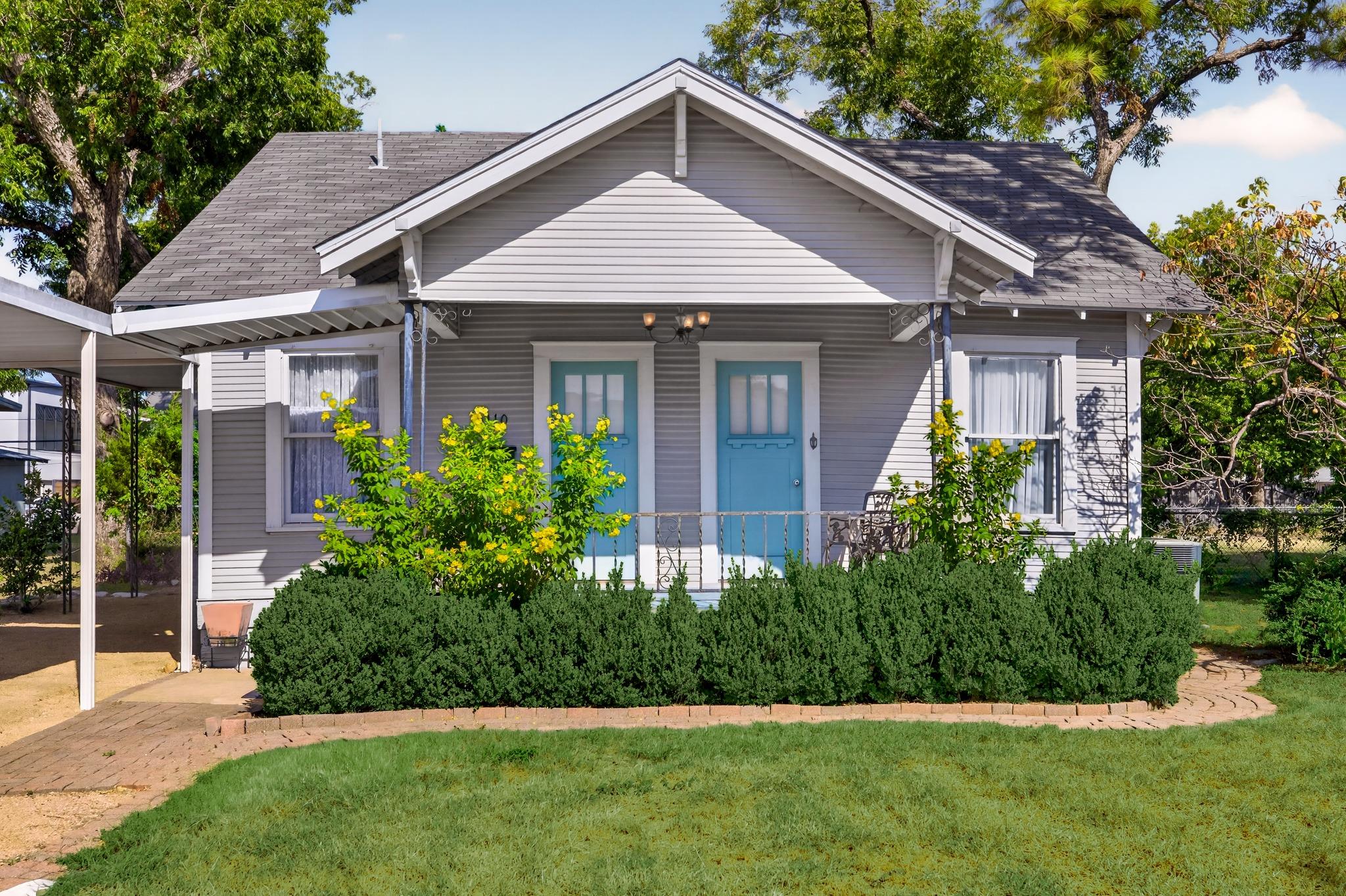Charming horizontal siding and a classic gabled r