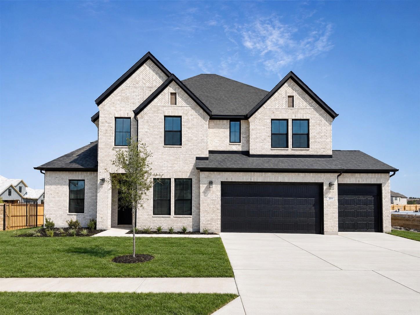 Striking brick exterior features steep gables alo