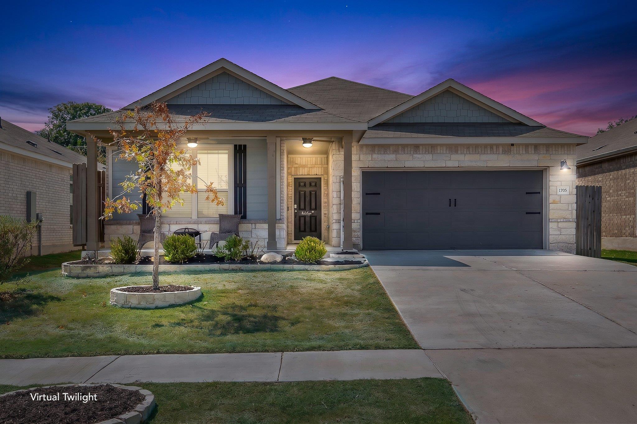 An inviting stone facade and a welcoming front po