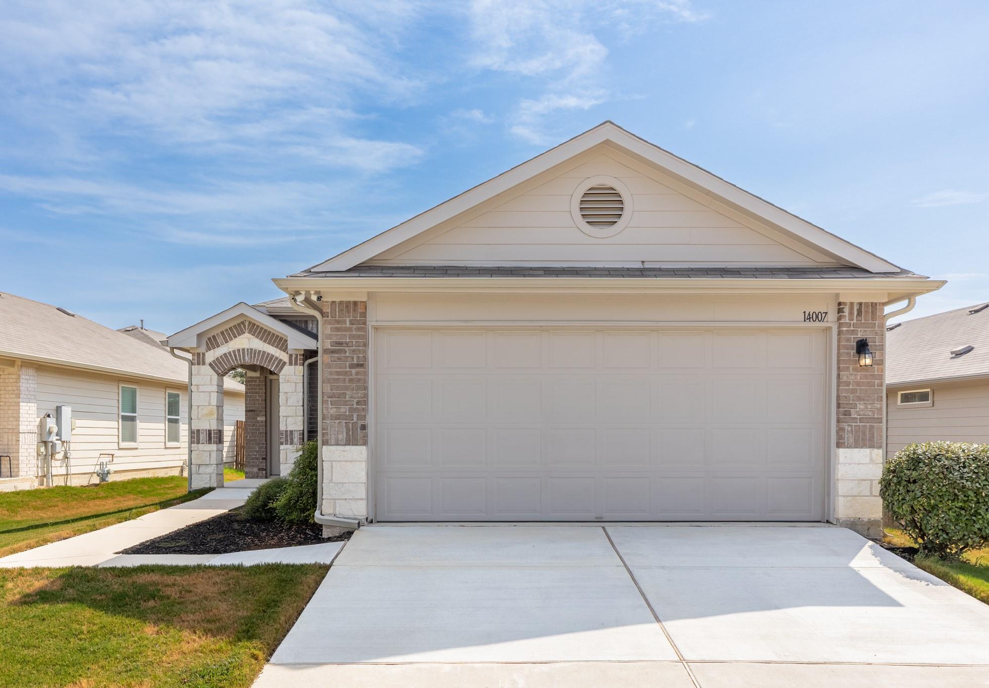 A classic brick accent facade framing a spacious 