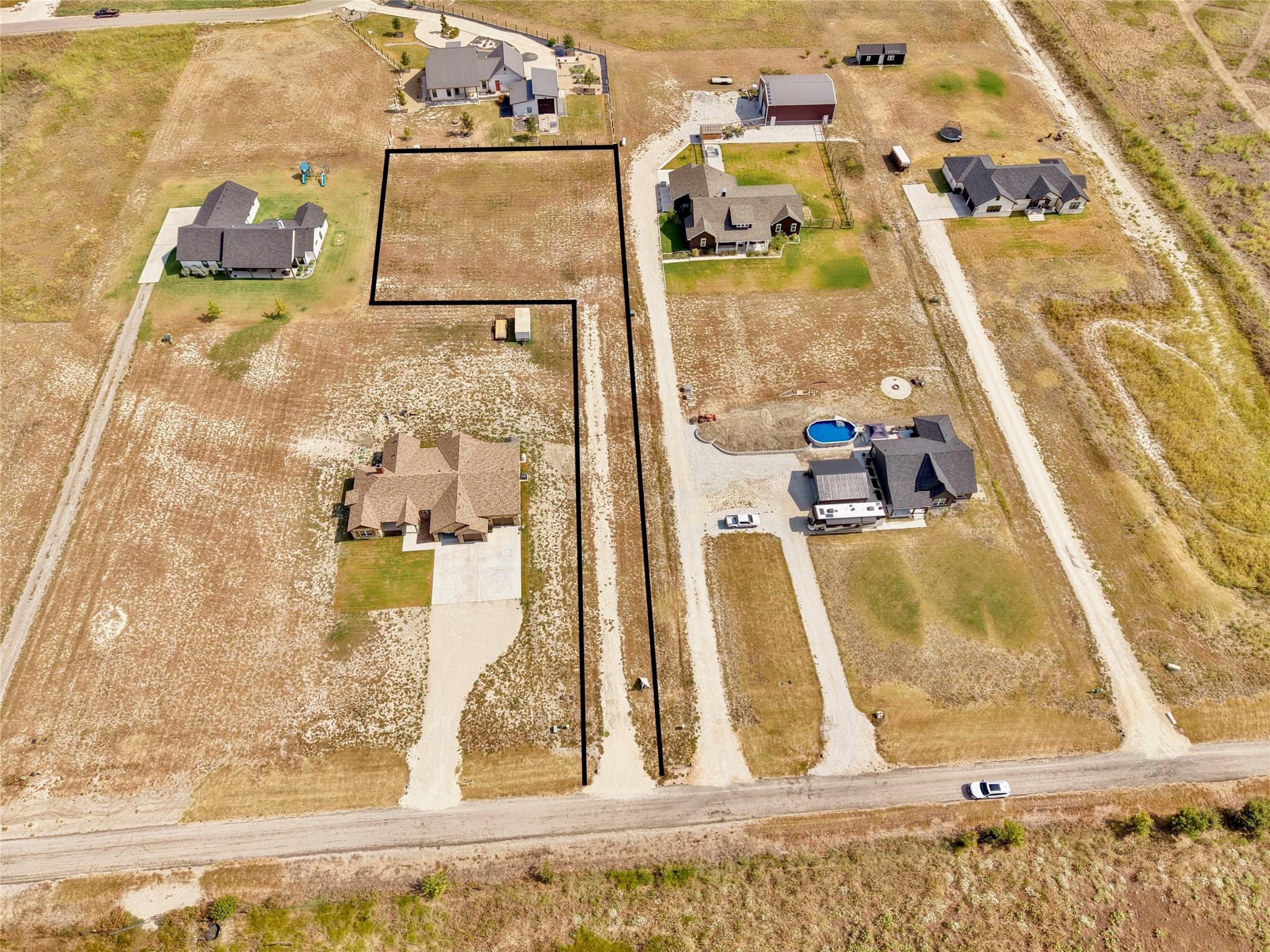 An expansive rural lot offers plenty of space for