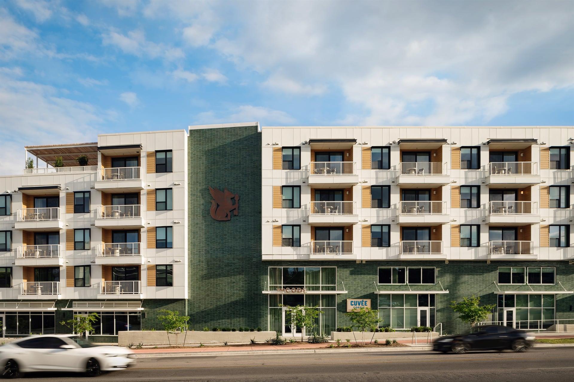 Sleek contemporary facade balances warm wood acce