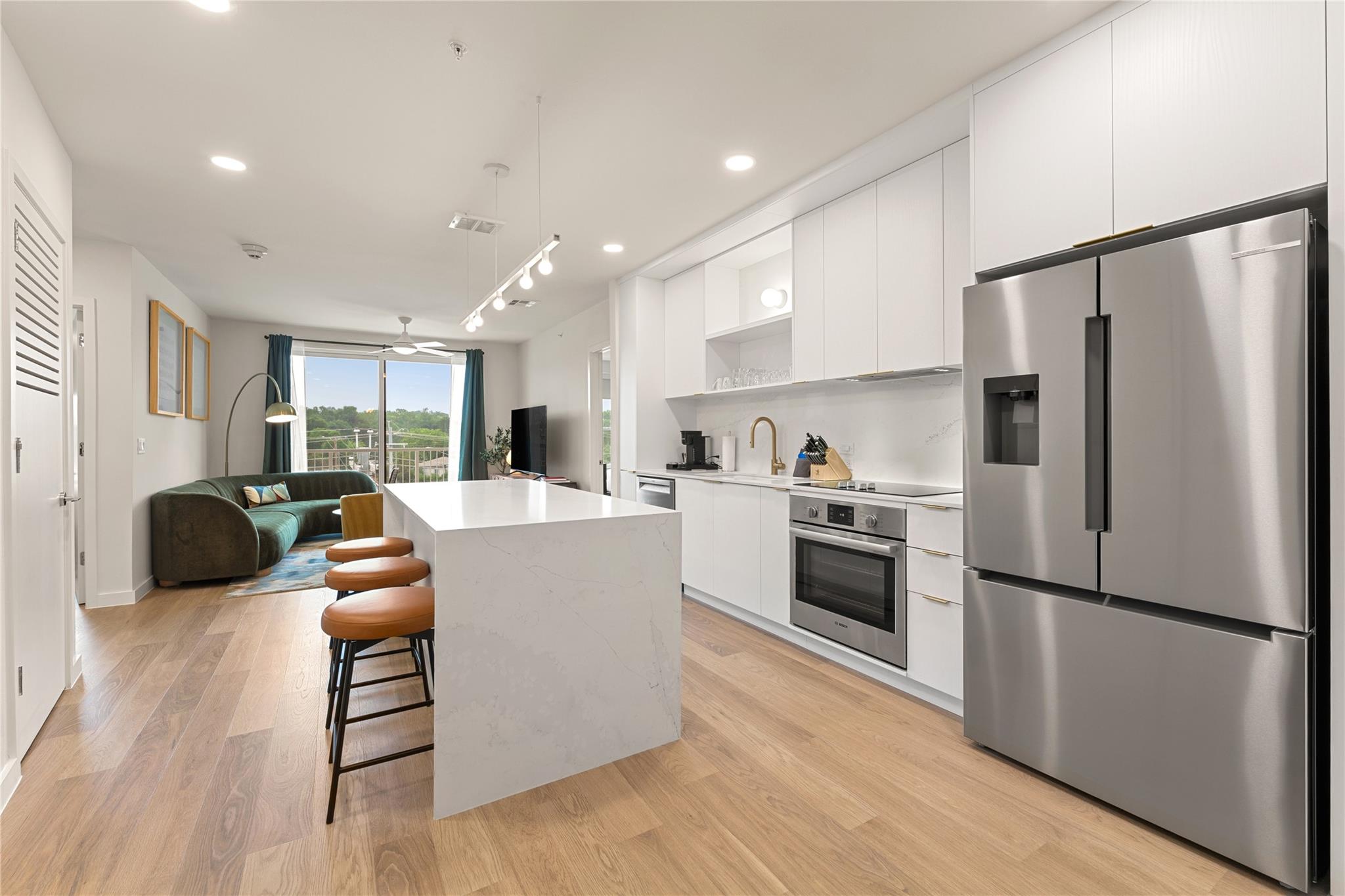 Clean lines and a spacious waterfall island defin