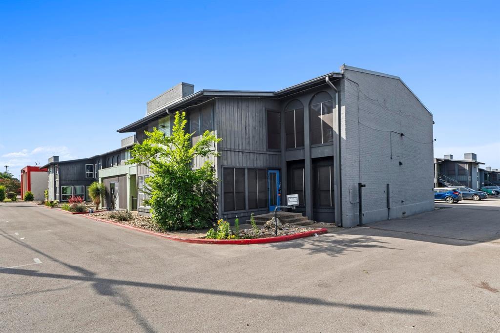 Multi-textured exterior finishes and tall windows