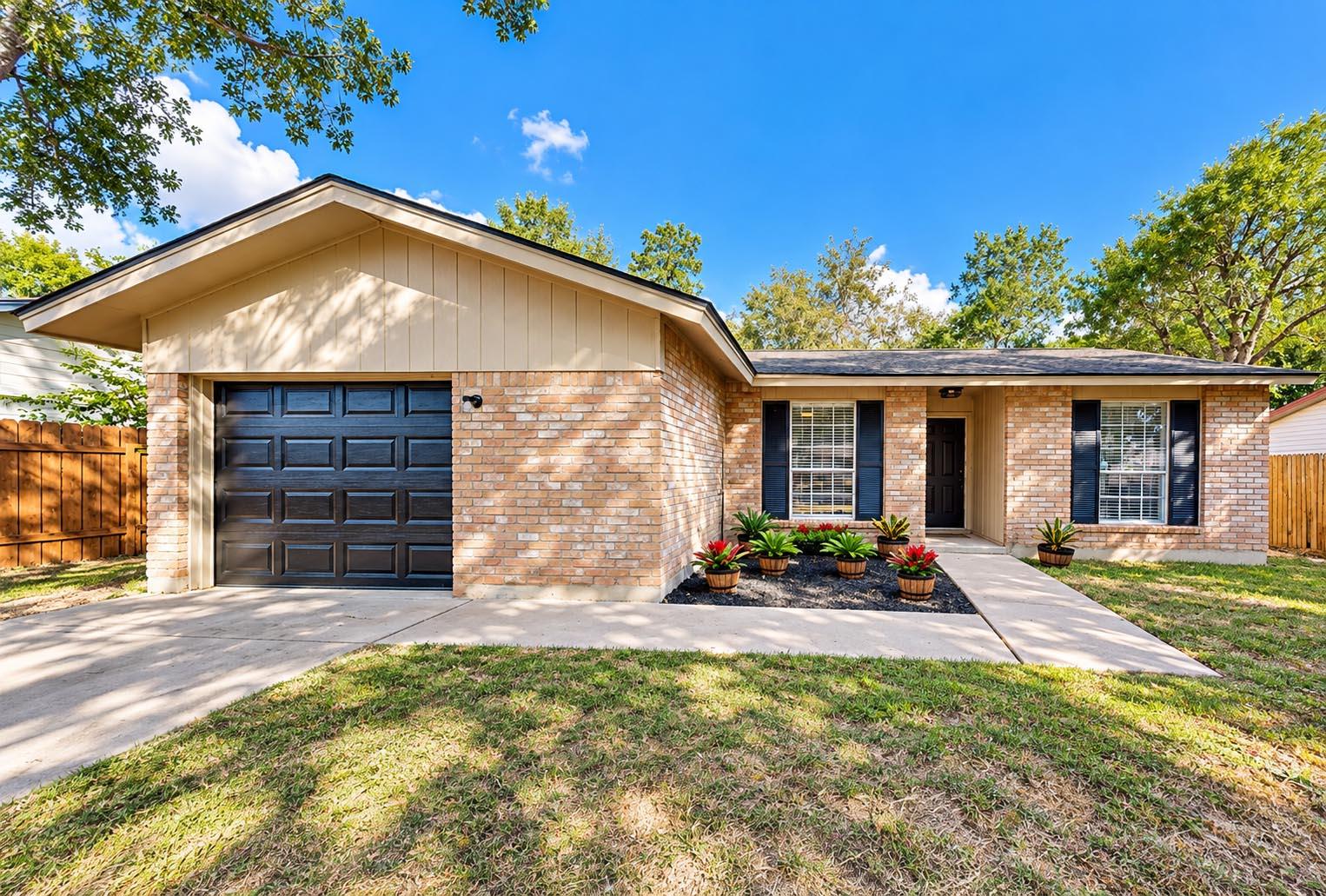 Classic brick exterior accents this charming sing