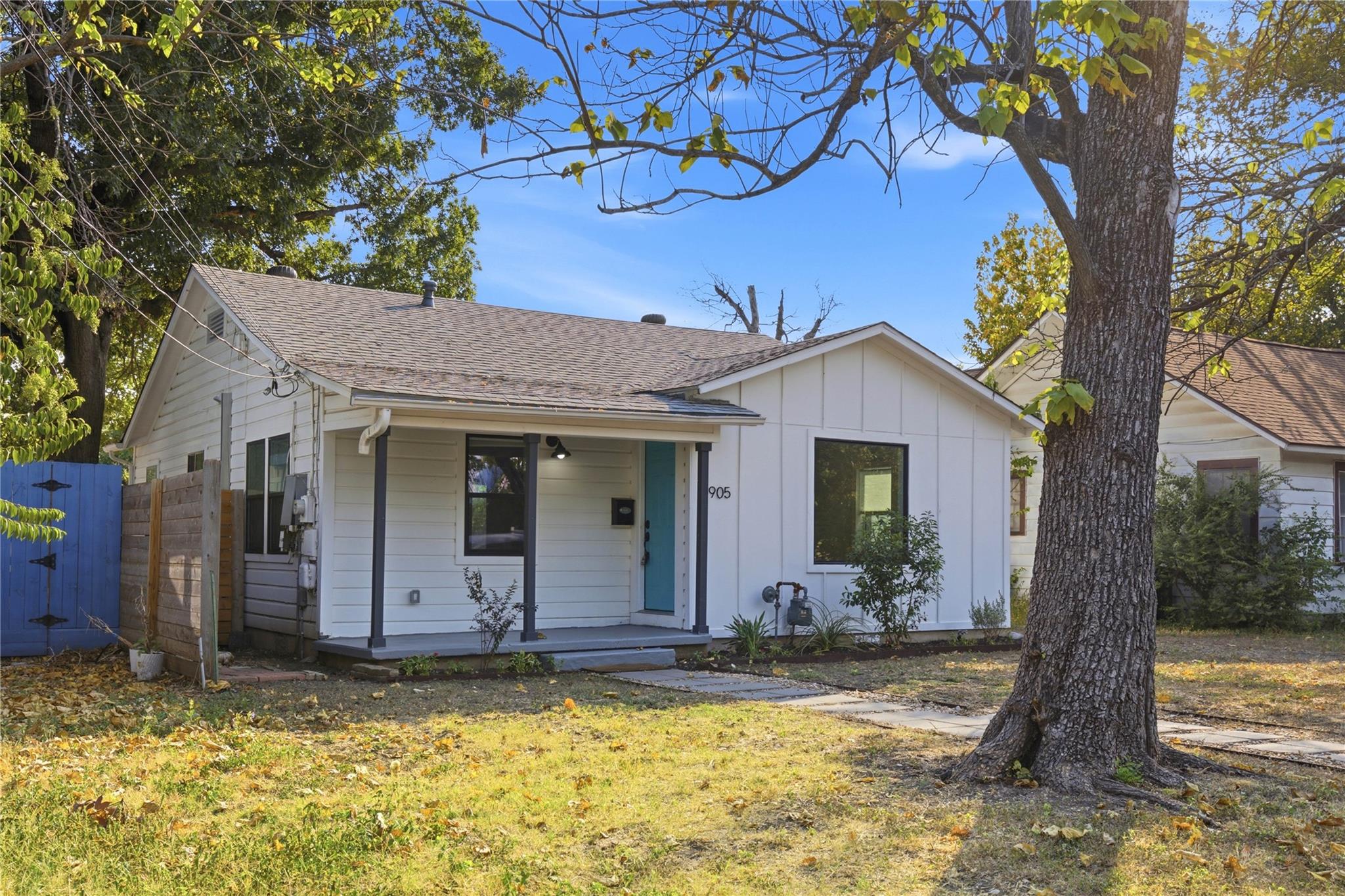 A welcoming front porch leads into this classic s