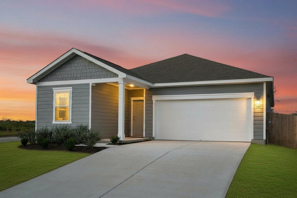 Crisp trim accents modern siding and a classic ga