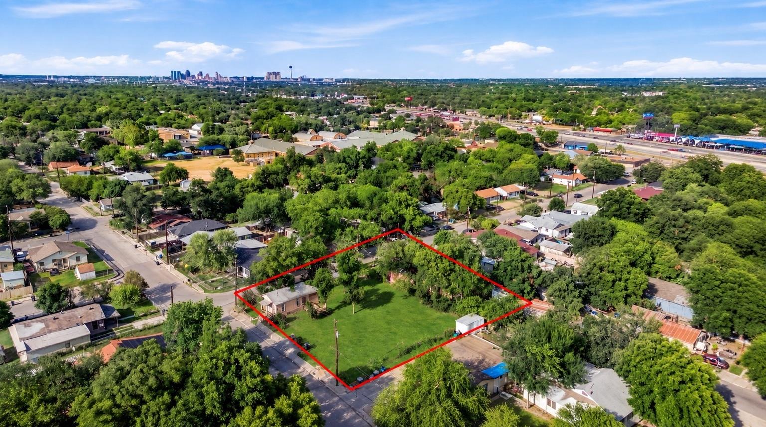 Mature trees surround this sizable neighborhood l