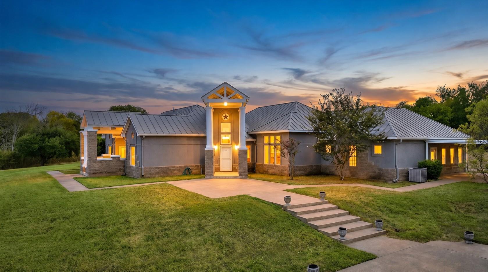 An architectural metal roof accents the exterior 