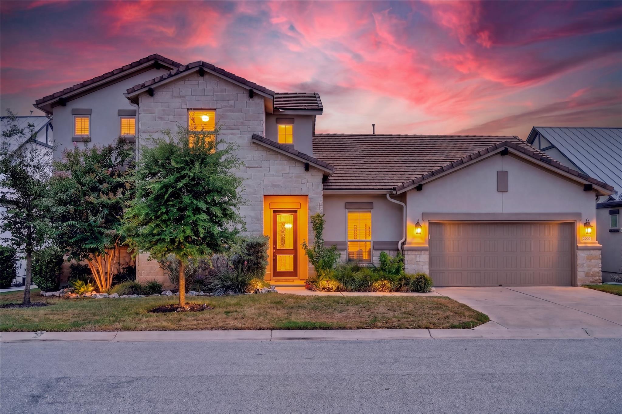 A stone and stucco facade creates strong curb app