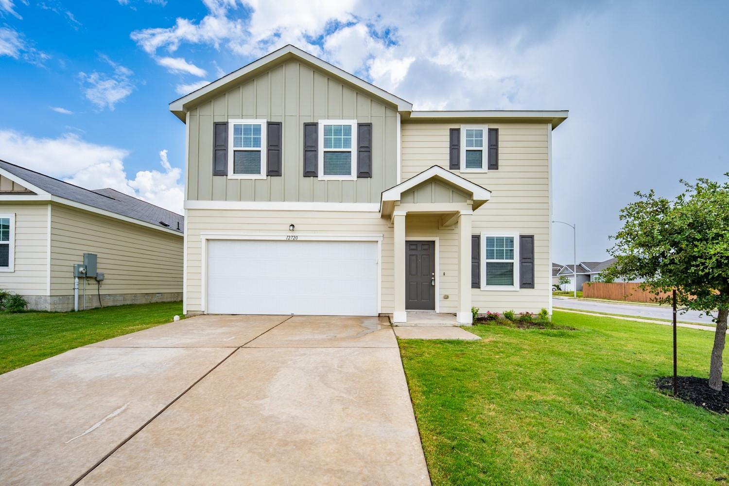 A classic two-story exterior features board and b