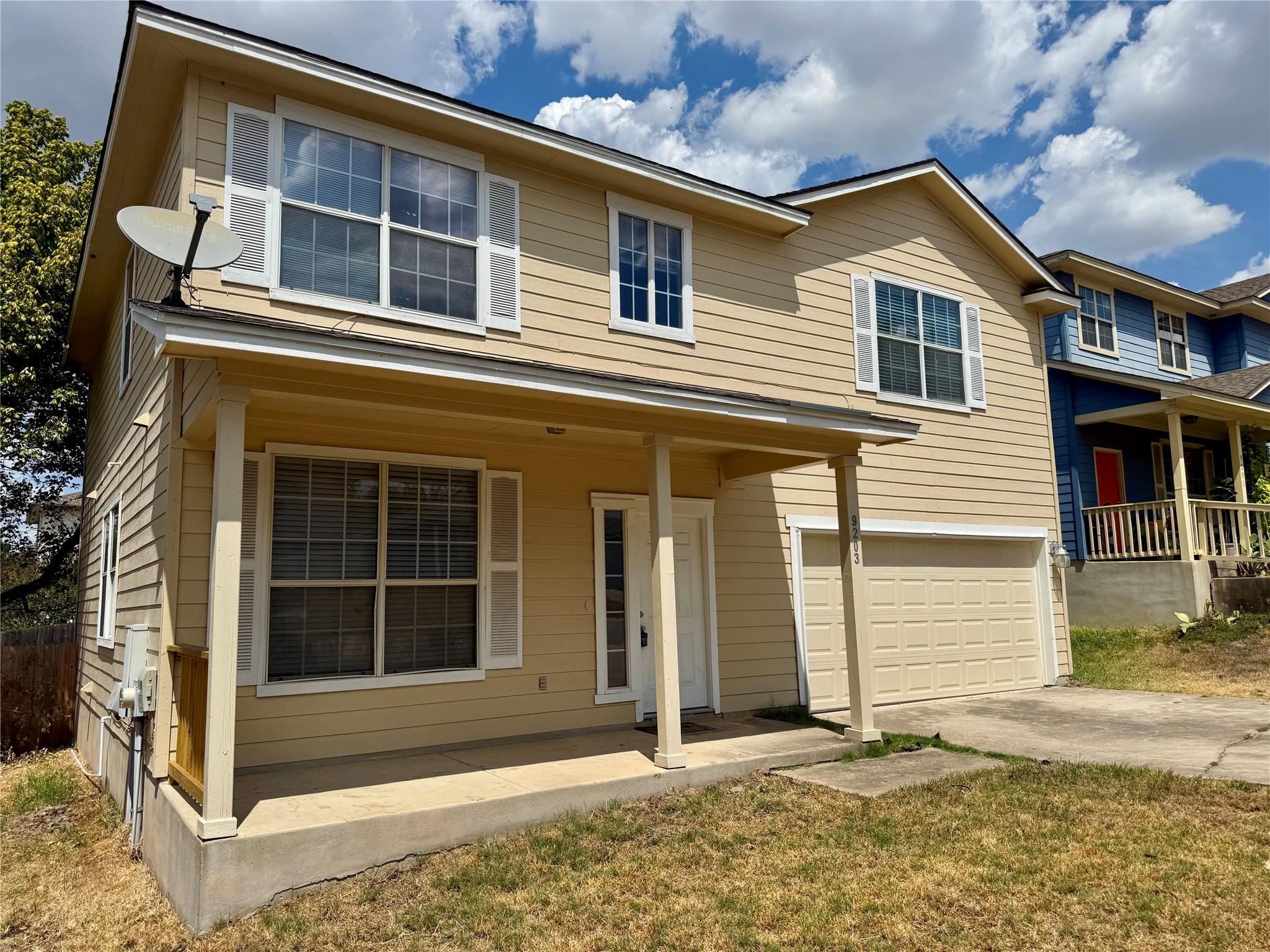 Traditional horizontal siding and a covered front