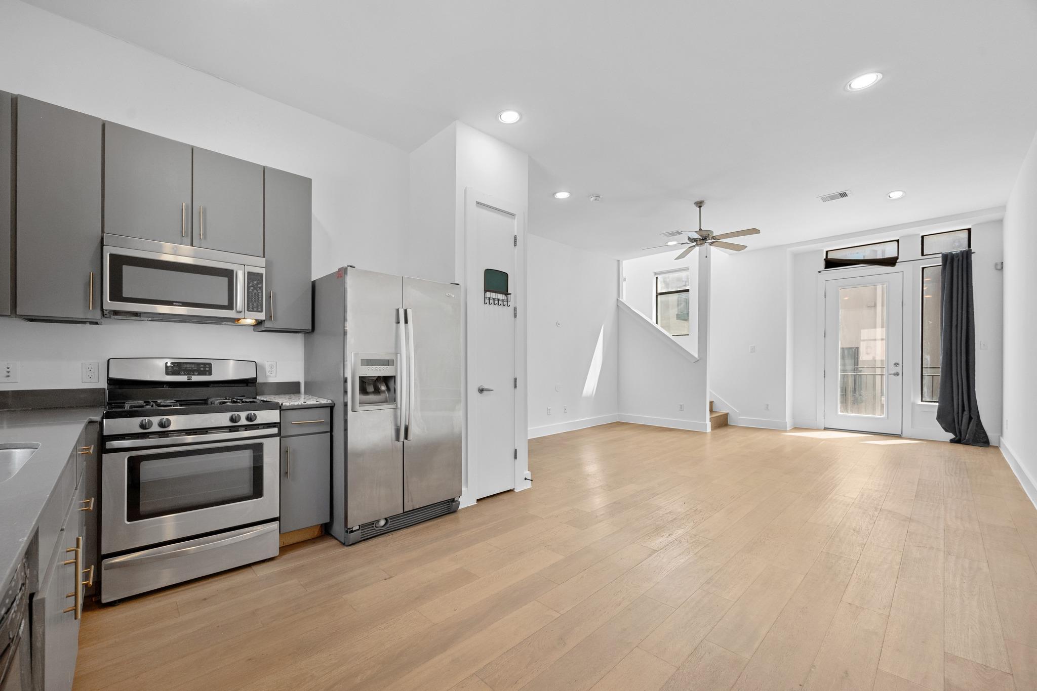 Clean lines and warm wood floors define this airy
