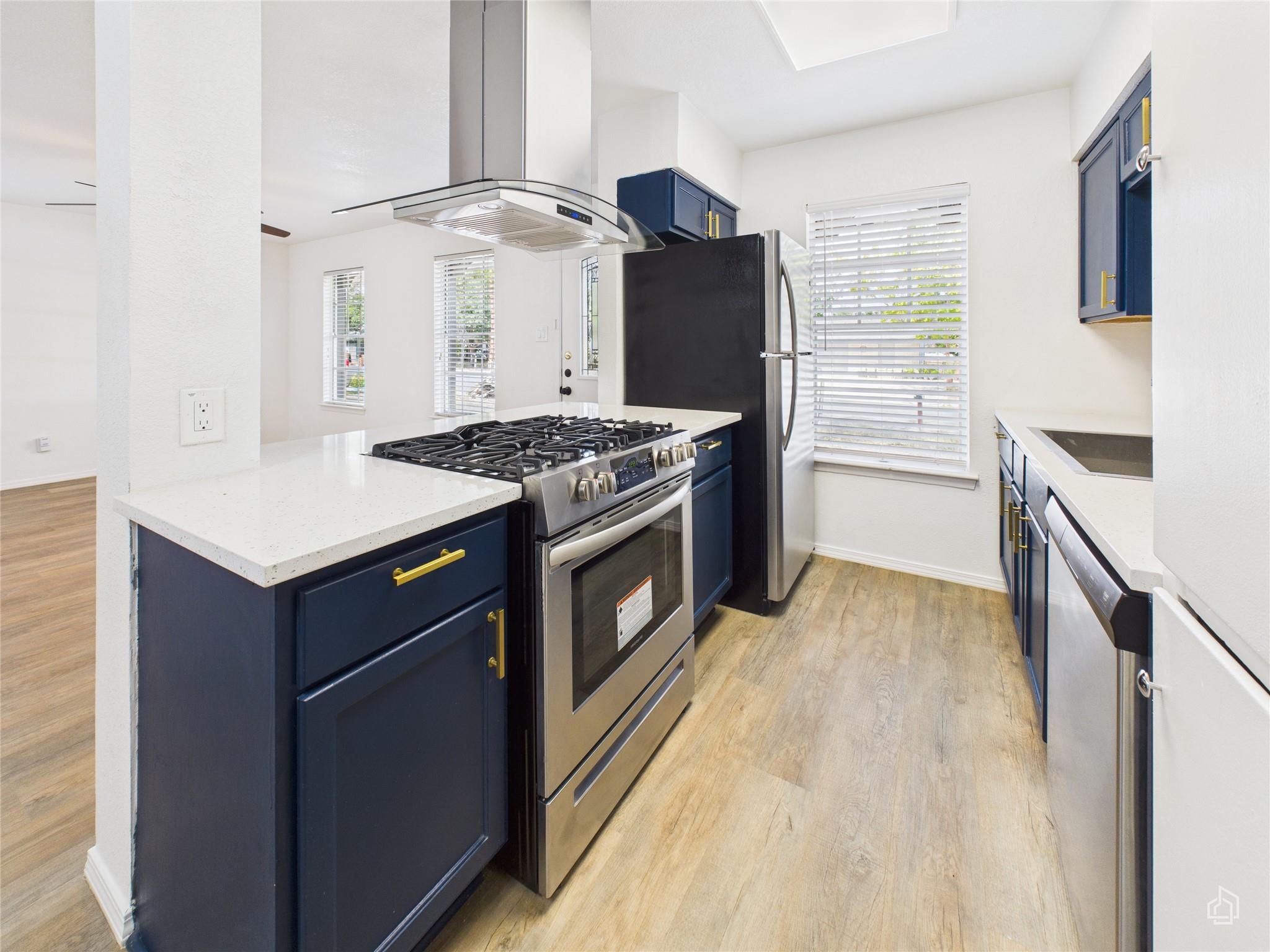 Gleaming stone countertops and modern cabinetry e
