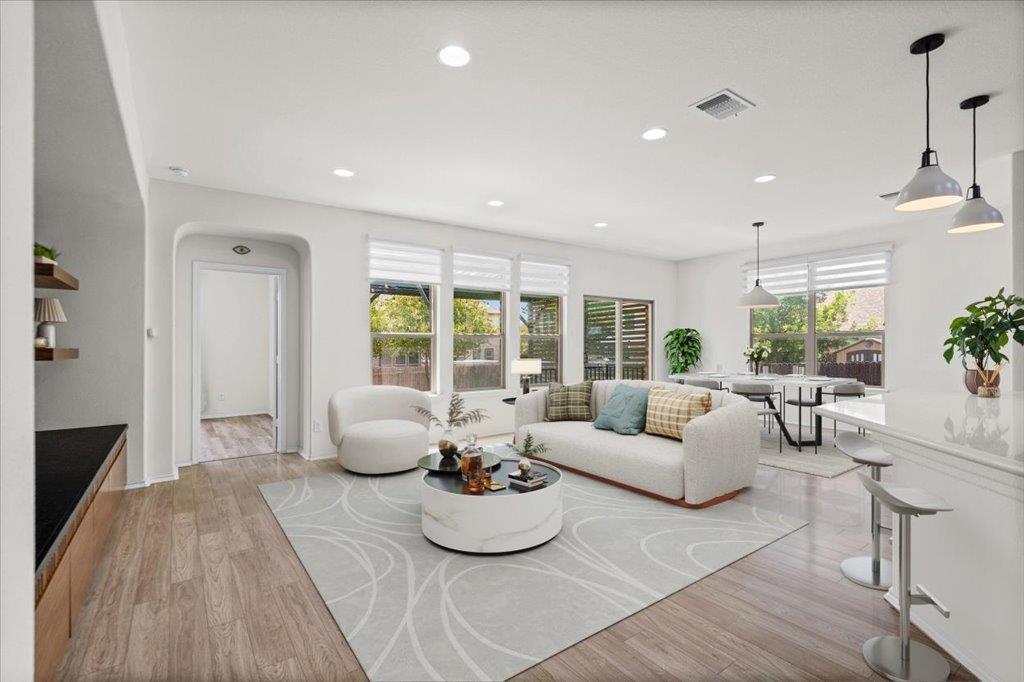 An open floorplan seamlessly connects the living 