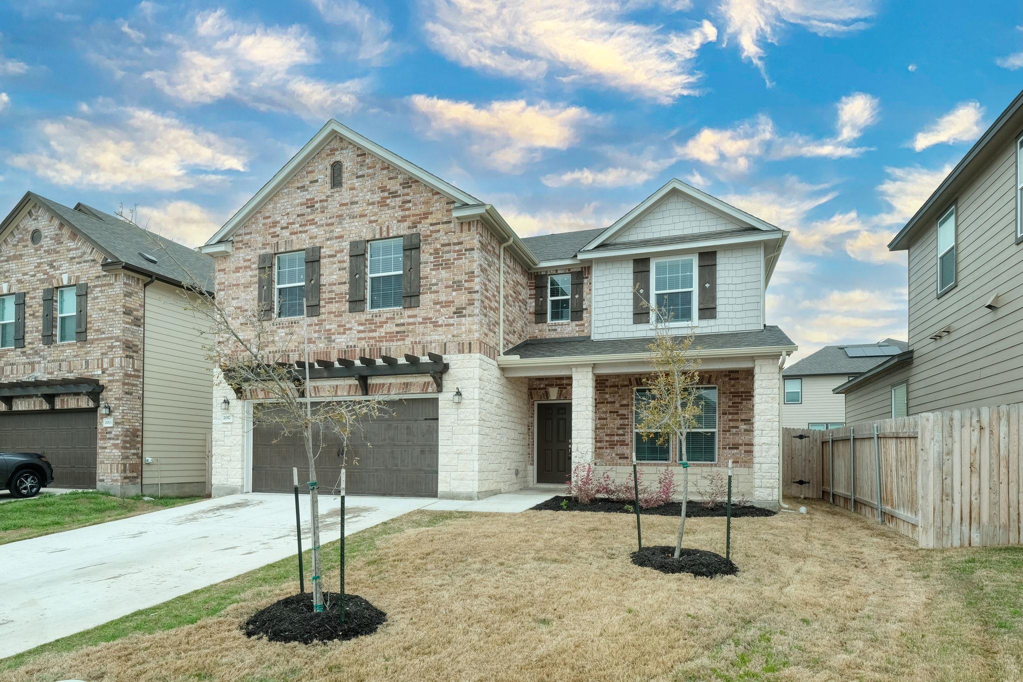 A classic brick exterior and covered front porch 