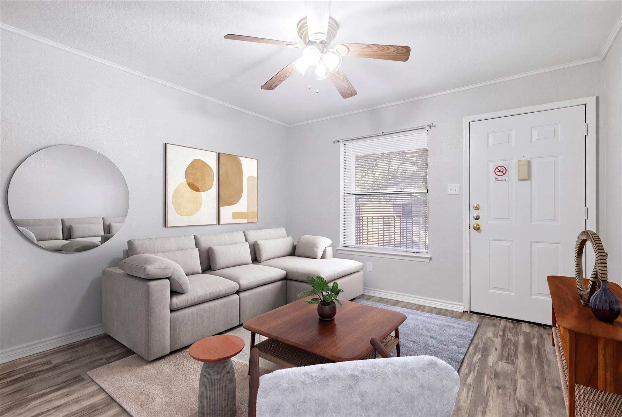 Smooth wood-style flooring and abundant natural l