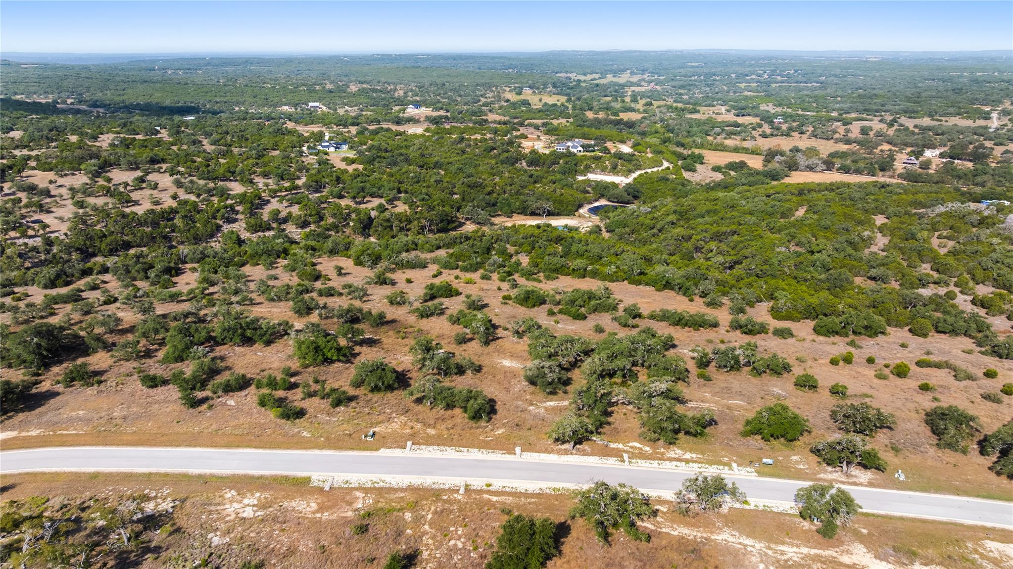 Vast acreage showcases rolling terrain and mature