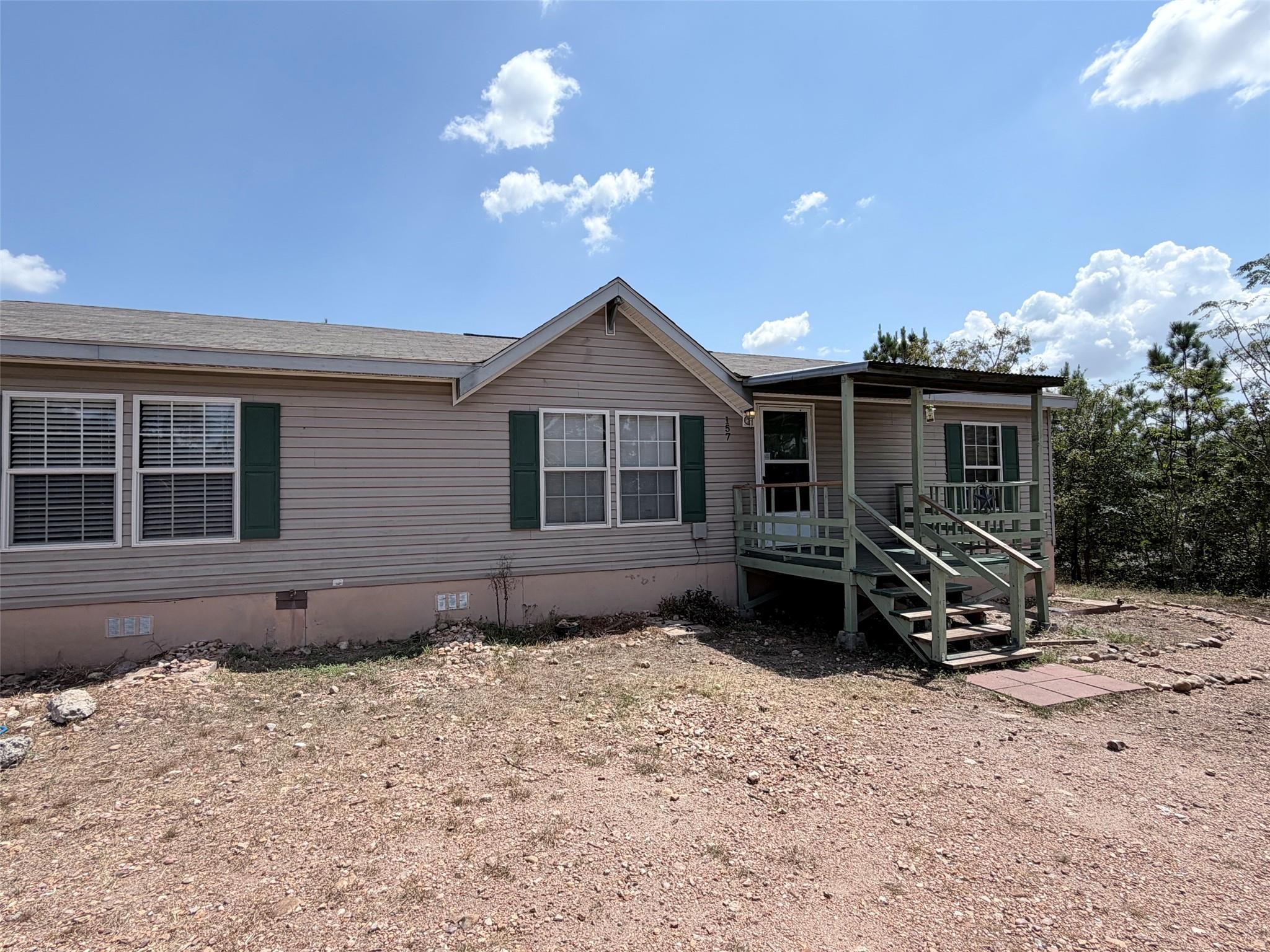 A covered front porch welcomes visitors to this c