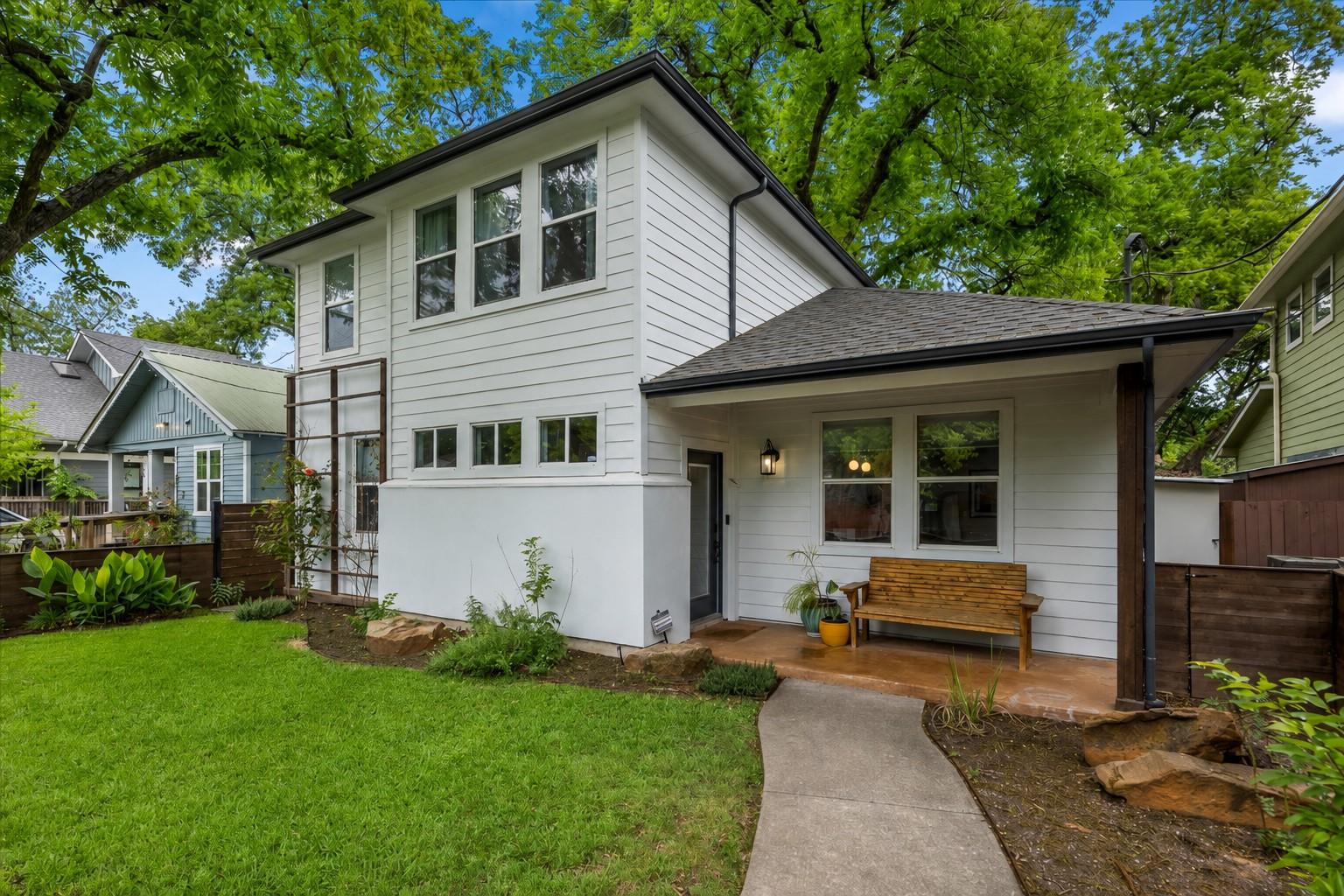 A graceful entry to this charming residence featu
