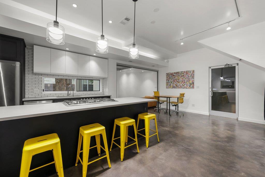 Polished concrete floors and high ceilings define