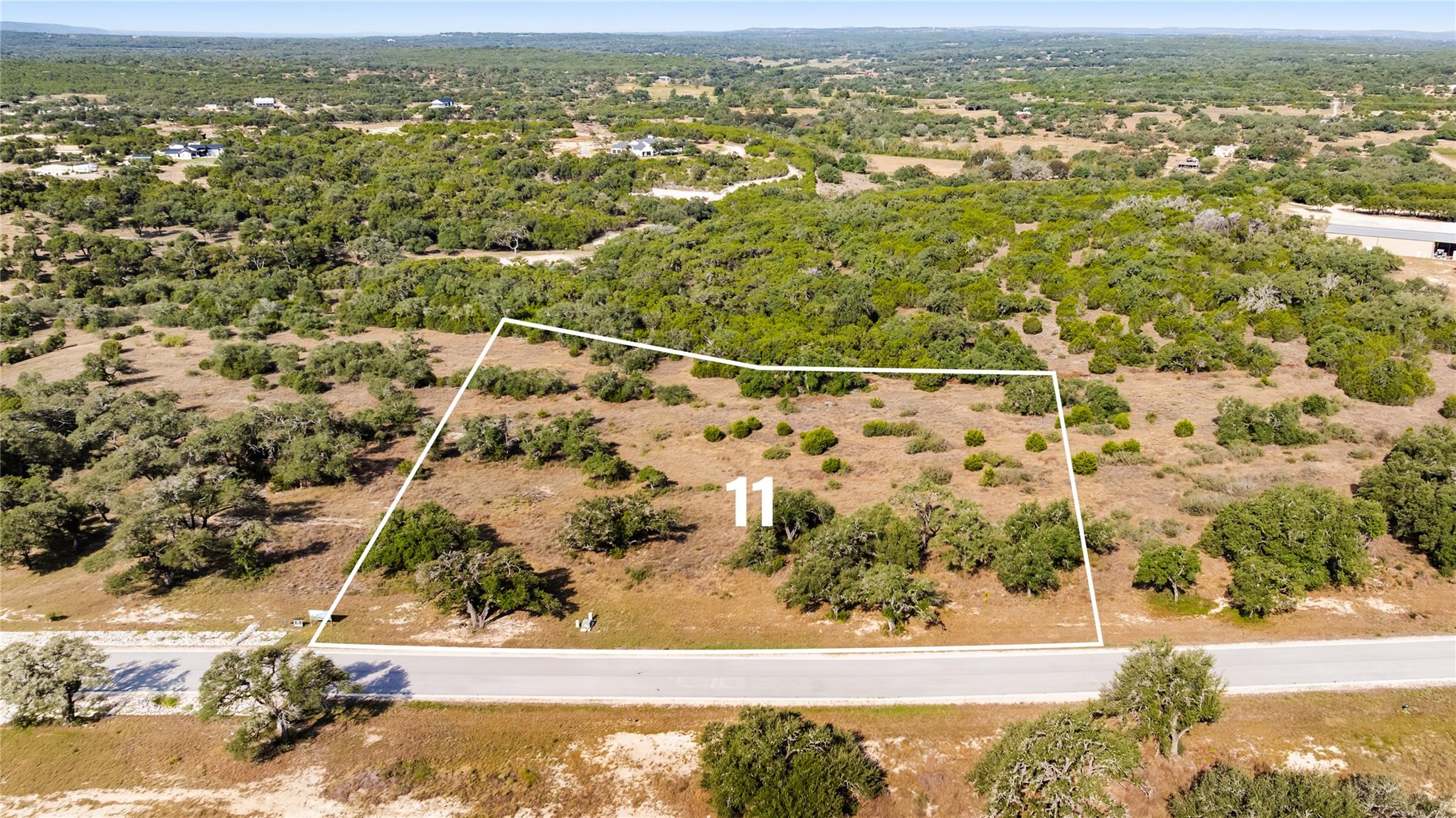 Mature trees and open spaces define this generous
