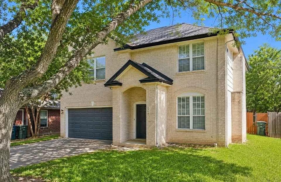 A classic brick exterior with a well-maintained l