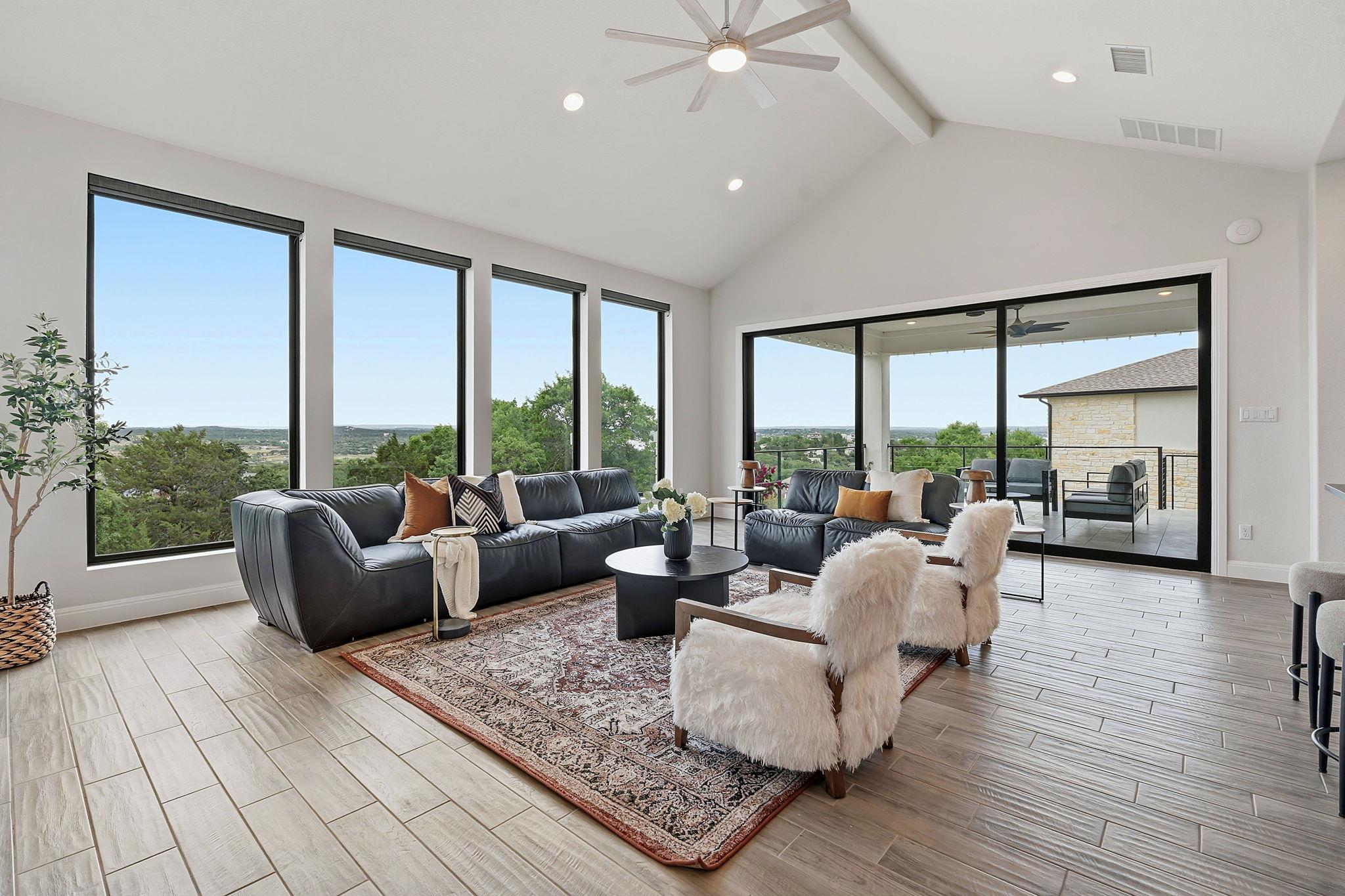 This room features a vaulted ceiling with a ceili