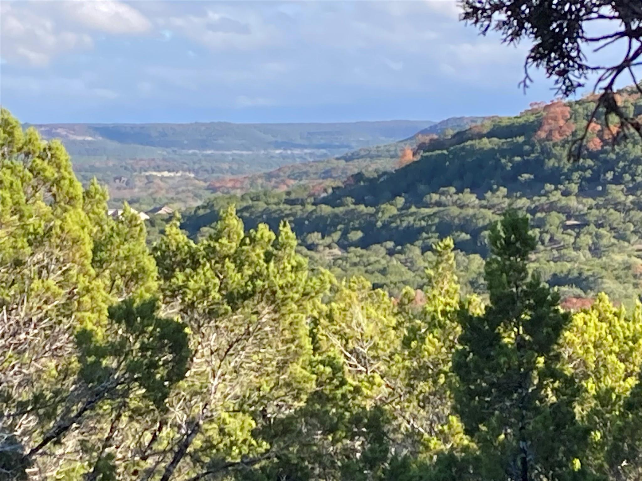Rolling green hills stretch toward the horizon un