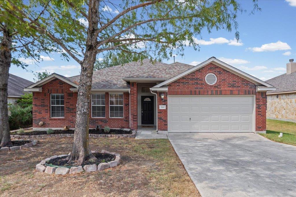 Classic brick craftsmanship defines this inviting