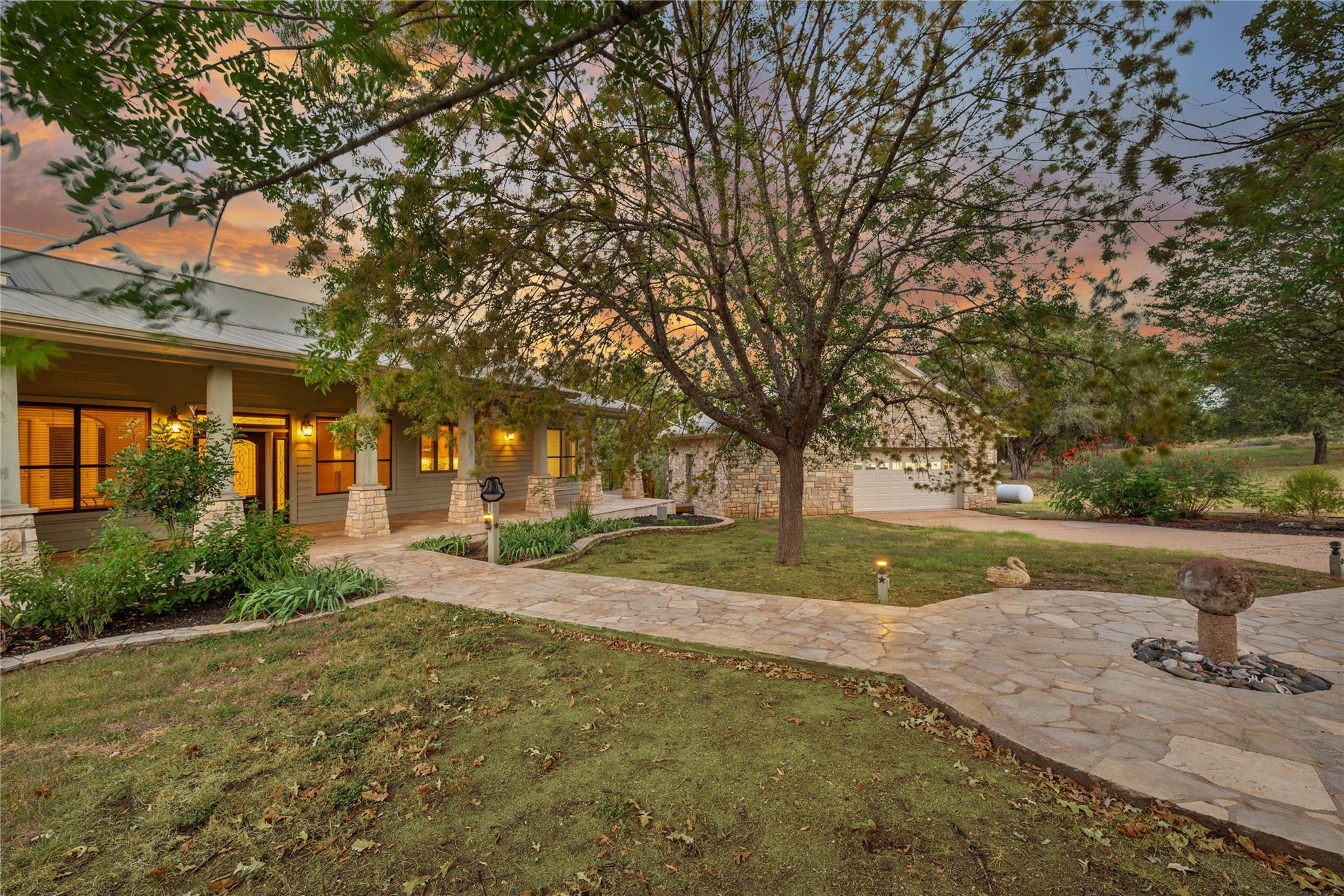 A stone pathway leads toward the welcoming front 