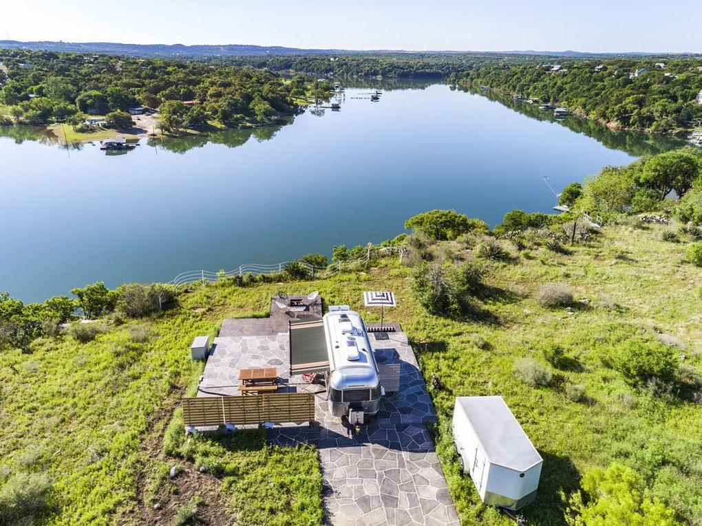 Sweeping water views highlight this elevated ston