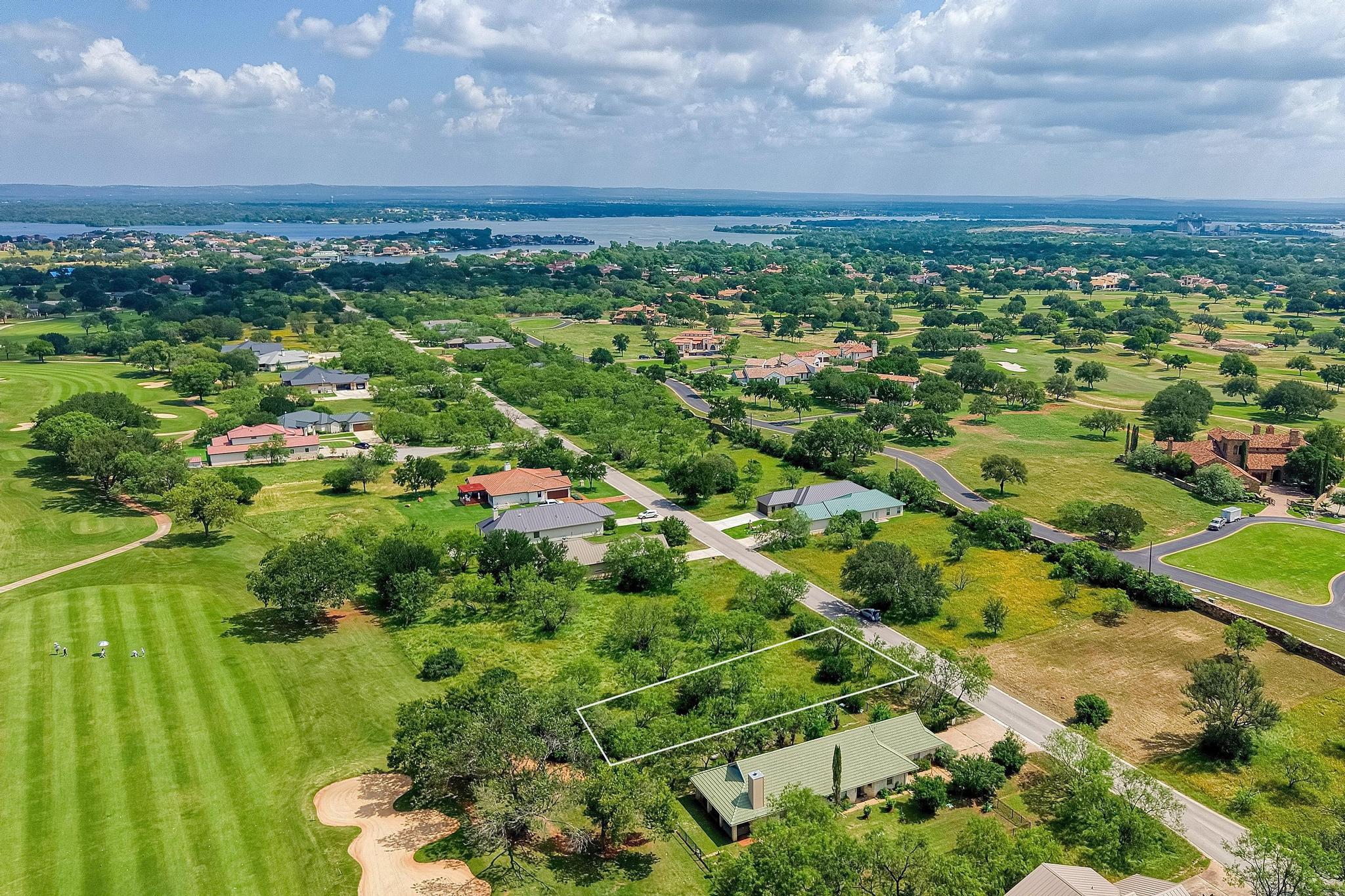An aerial perspective showcases a buildable lot n