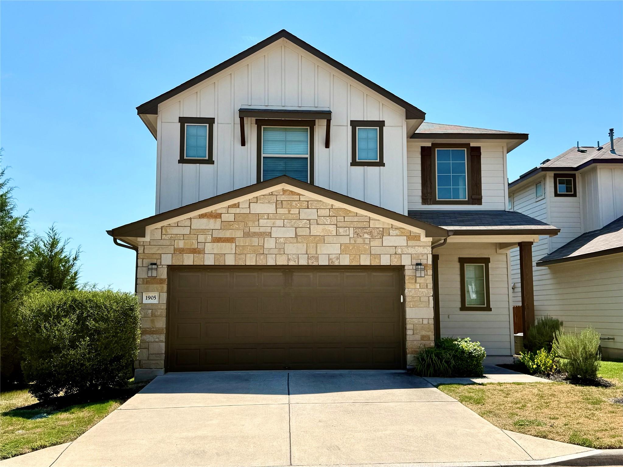 View of front of house featuring stone siding, co