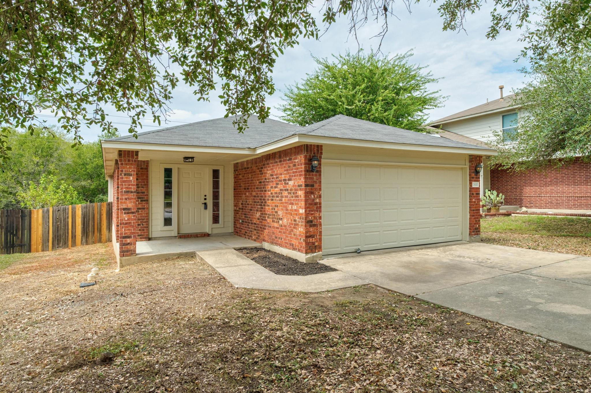 Classic brick exterior accents this single-story 