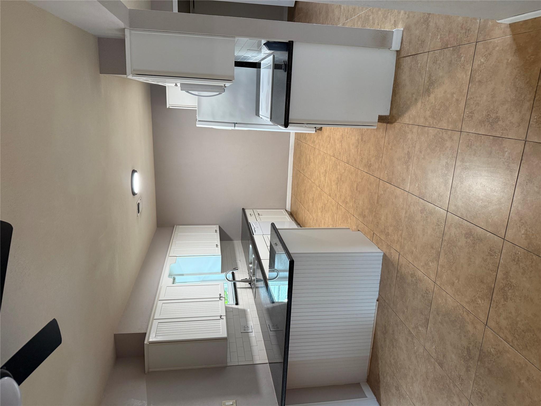 Ample counter space and classic cabinetry define 