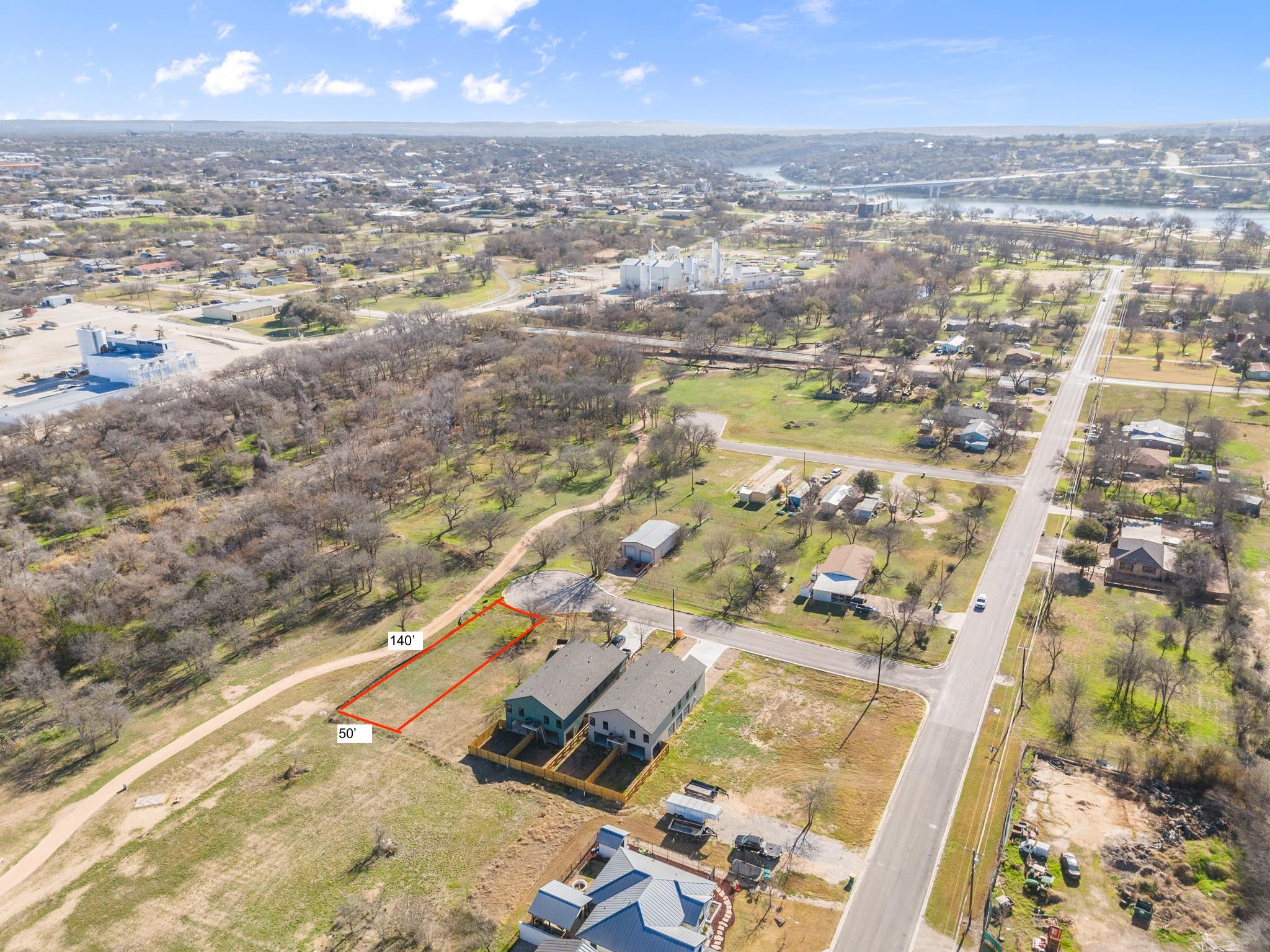 An aerial perspective showcases the buildable lot