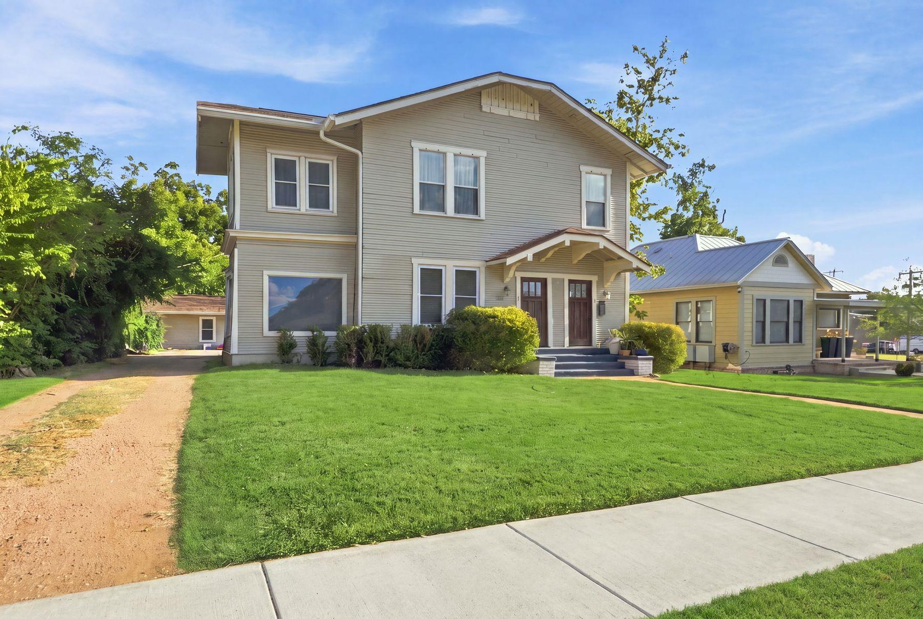 A classic two-story exterior showcases a balanced