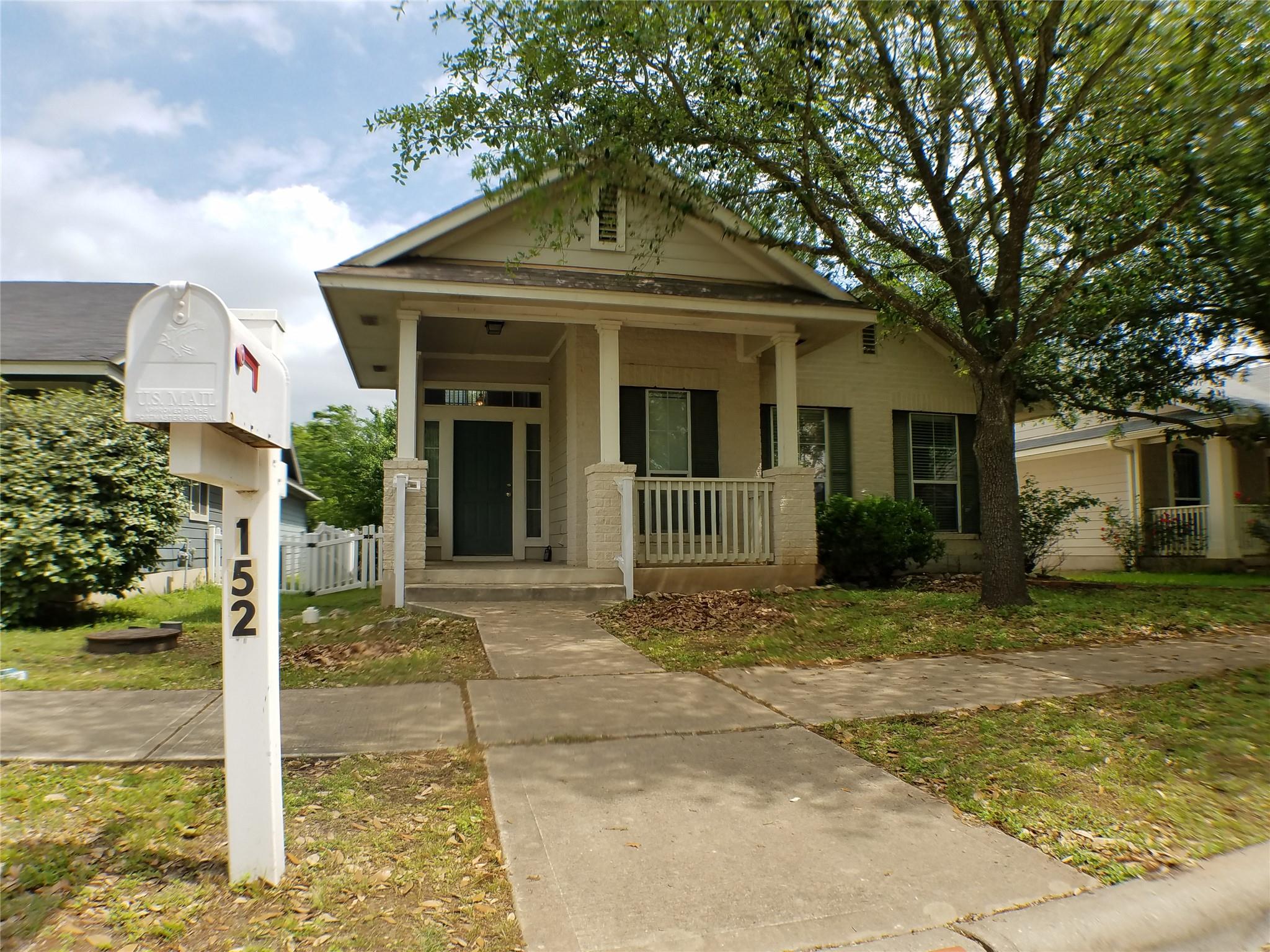 Classical columns support the covered front porch
