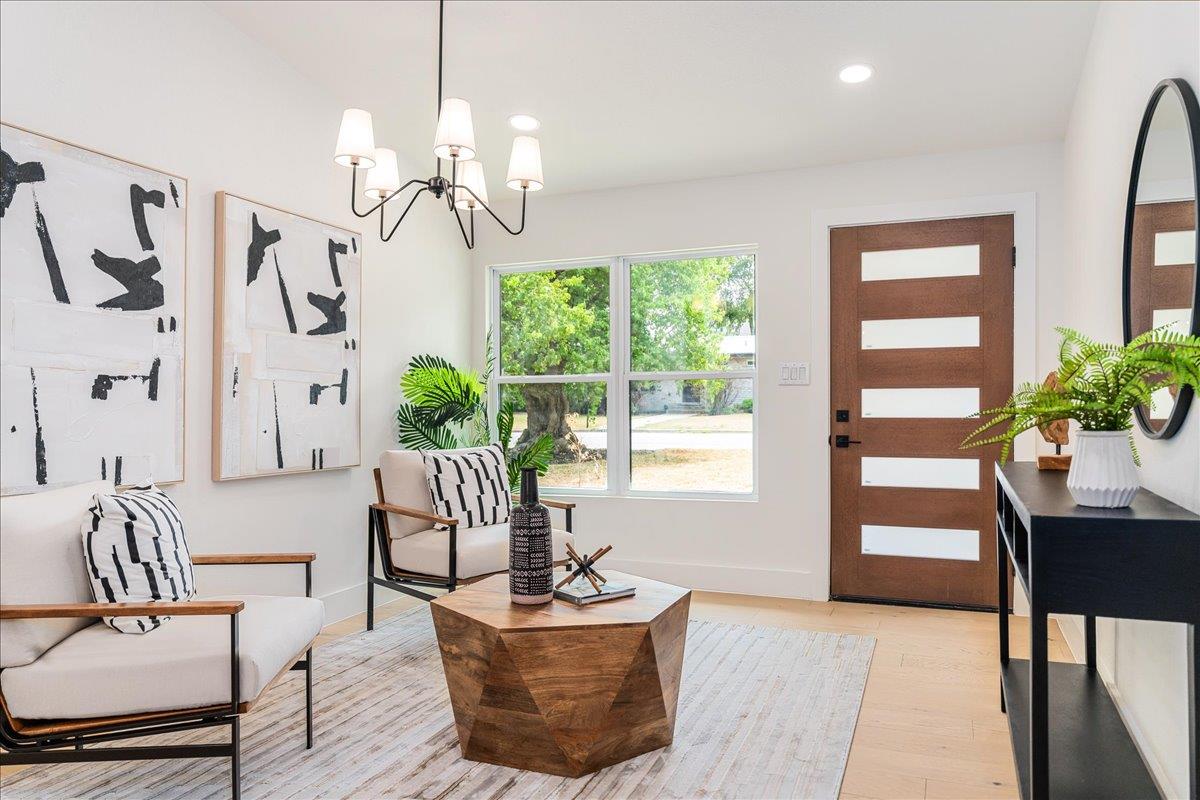 Natural light pours through large front windows o
