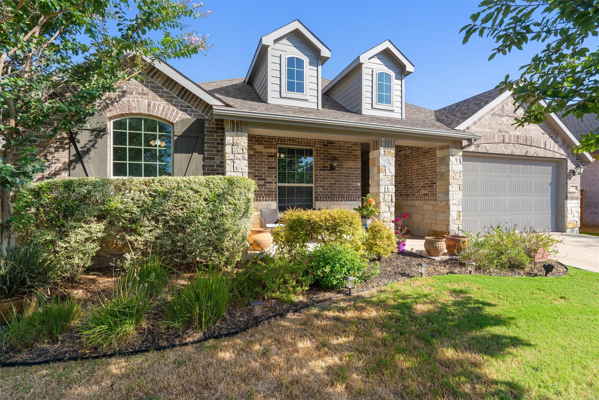 Classic brick and stone elements frame the welcom