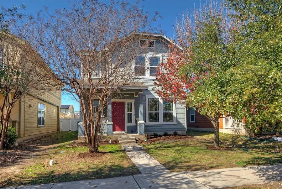 Charming horizontal siding and a covered front po