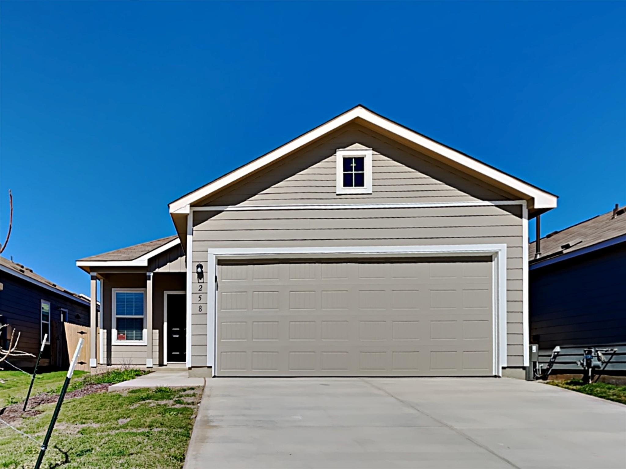 Siding accents the clean architectural lines of t