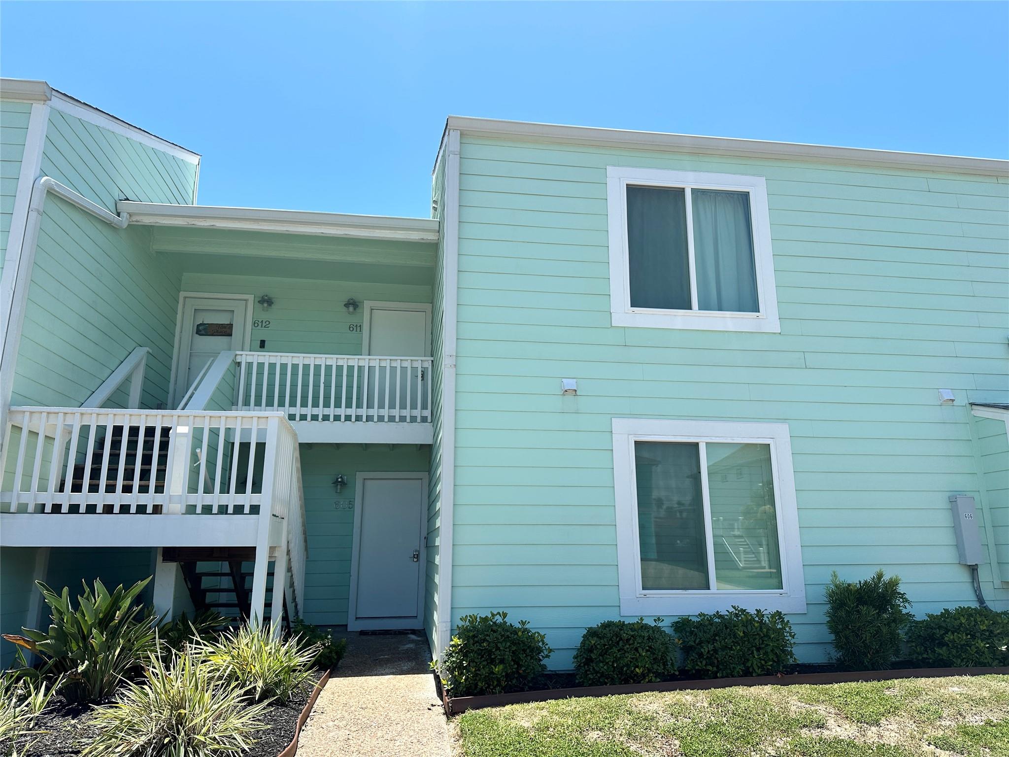 Clean lines and classic siding define this multi-
