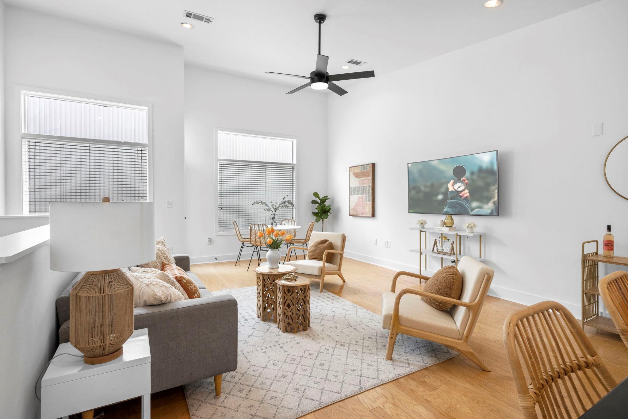 High ceilings and tall windows enhance this light