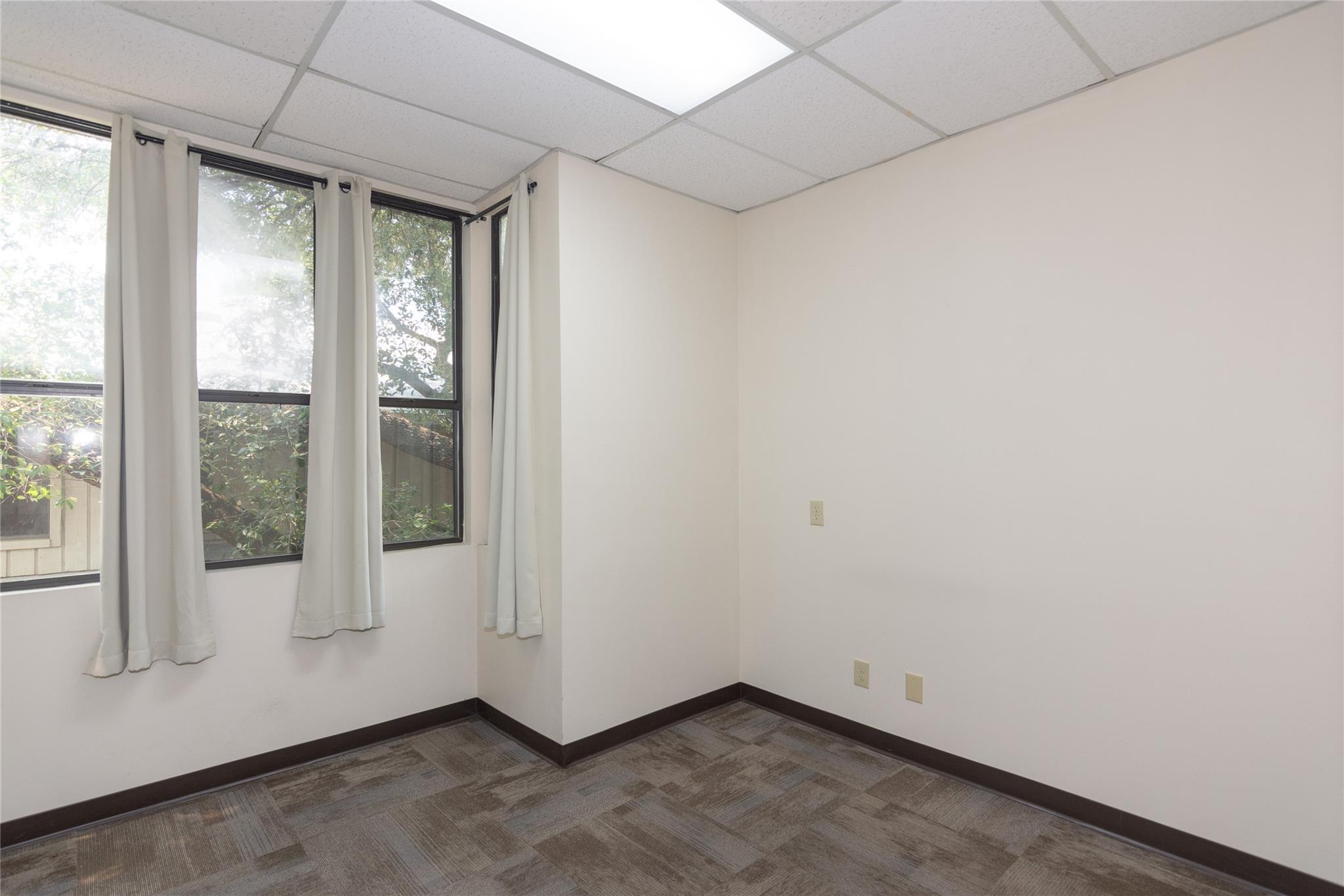 Large windows bring natural light into this versa