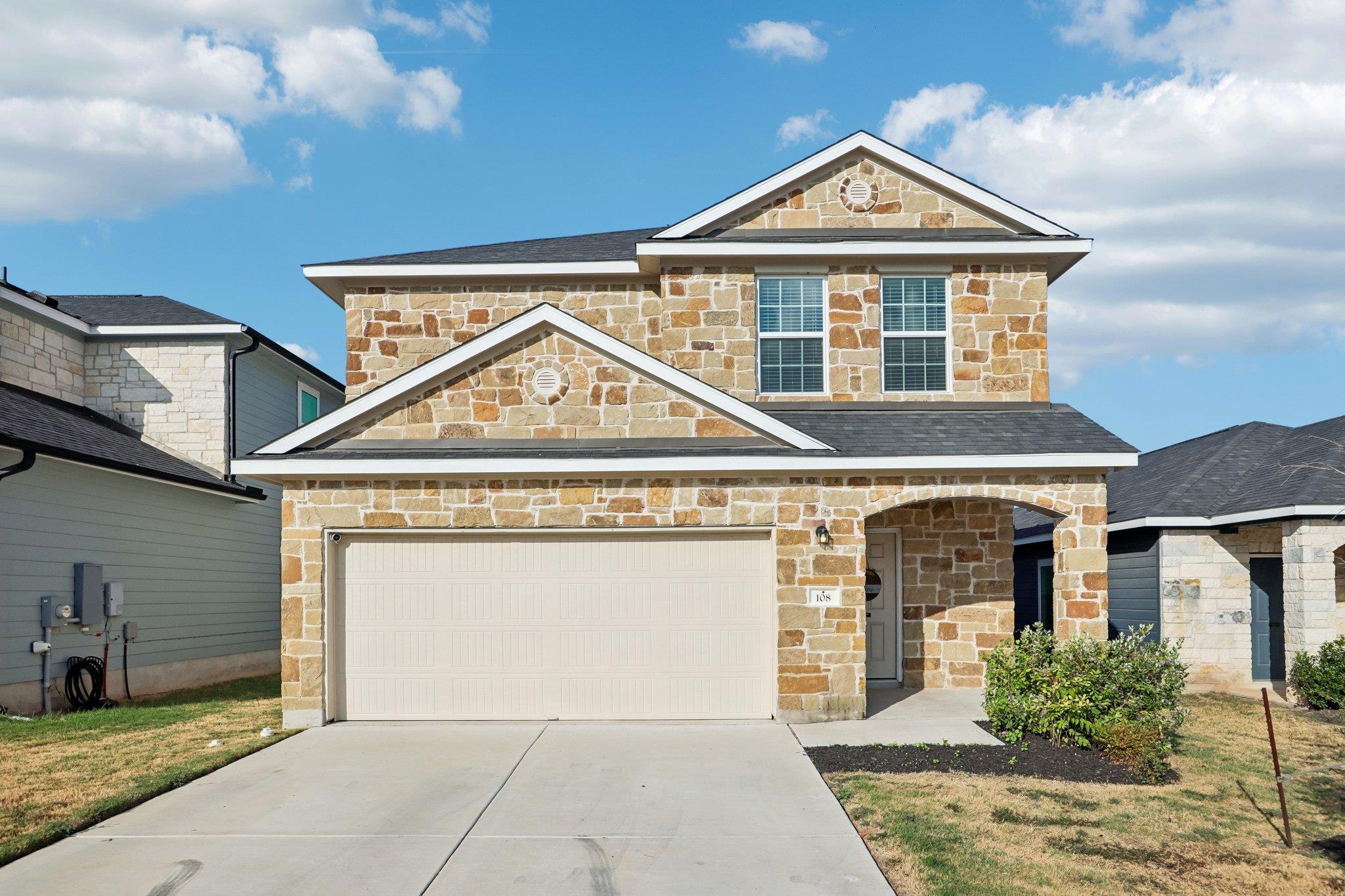 Natural stone masonry lends timeless architectura