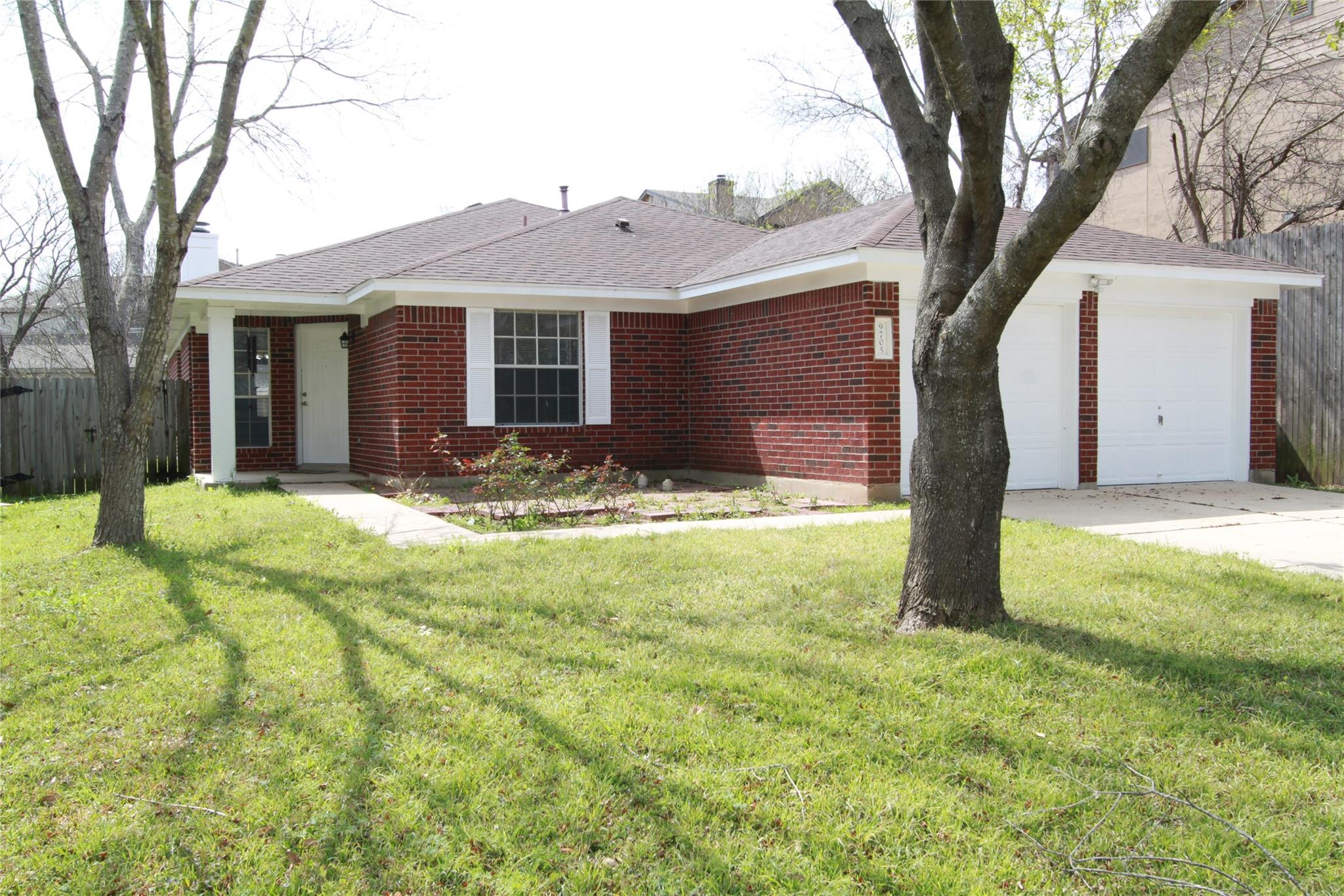 Classic brick veneer siding pairs beautifully wit