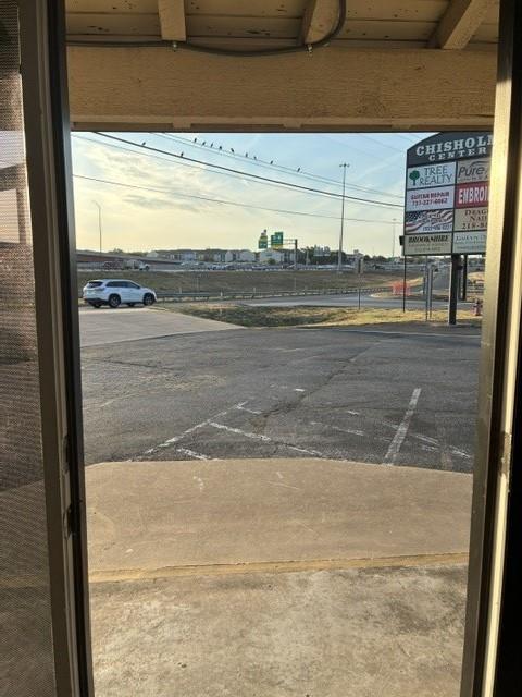 A view through the sliding glass door reveals an 